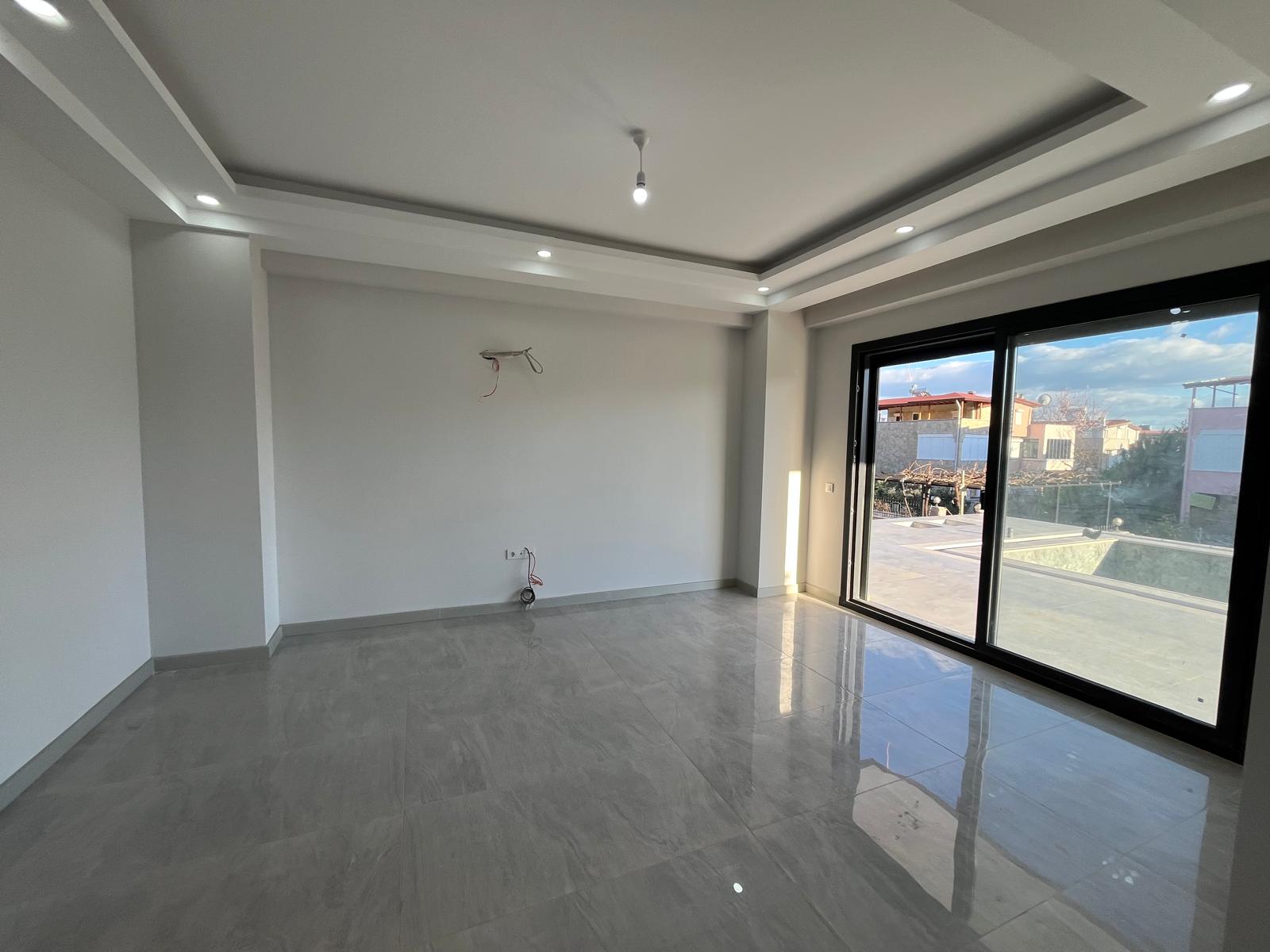 GÜRE SAHİLİNDE TAM MÜSTAKİL SAUNALI FOURLEX DENİZ MANZARALI KAPALI GARAJLI ULTRA LÜX VİLLA - Görsel 15